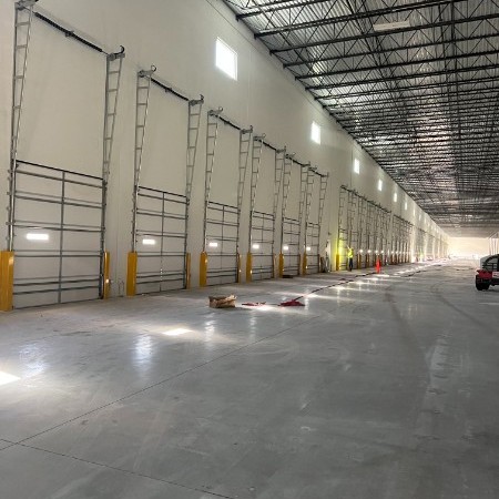 Technician servicing a loading dock